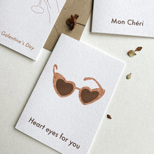 Load image into Gallery viewer, Heart eyes for you heart shaped sunglasses illustrated greeting card with natural kraft envelope. The illustrated retro sunglasses card by Megan Heloise is simple and elegant, ideal for your lover, Galetine, Valentine or as a birthday or anniversary card.
