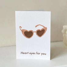 Load image into Gallery viewer, Heart eyes for you heart shaped sunglasses illustrated greeting card with natural kraft envelope. The illustrated retro sunglasses card by Megan Heloise is simple and elegant, ideal for your lover, Galetine, Valentine or as a birthday or anniversary card.
